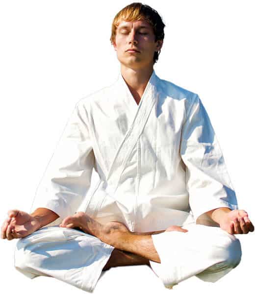 Martial Arts Lessons for Adults in __CITY__ __STATE__ - Young Man Thinking and Meditating in White